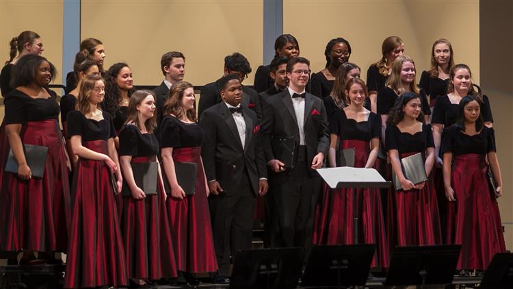 Choral Commitments: When Art and Competition Face Head to Head